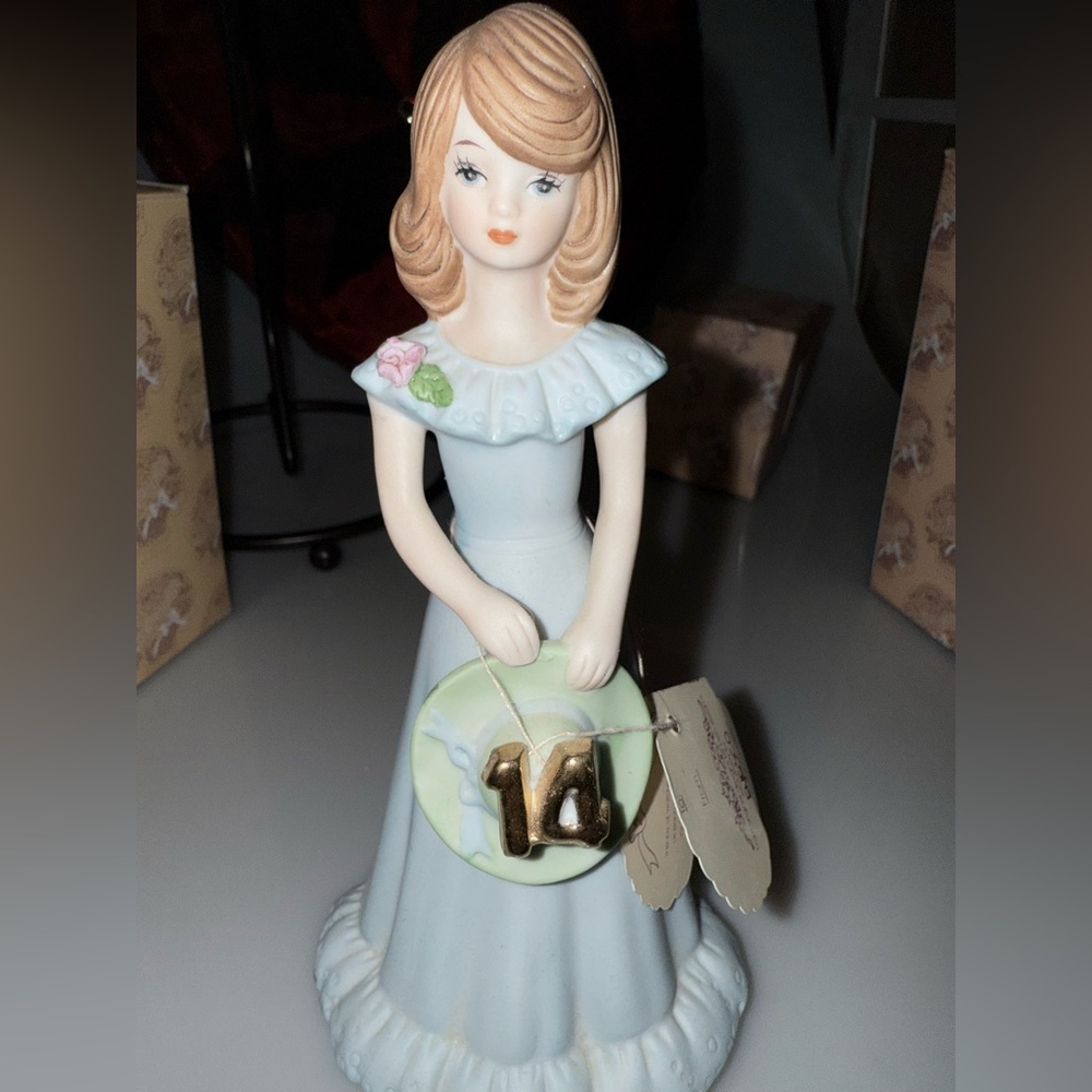 Porcelain Girl Figurine with Gold Accents